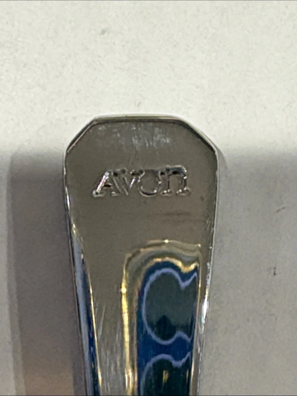 Avon collectors fruit spoons and hang rack